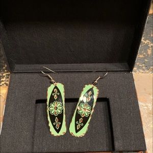 Beautiful handmade earrings on copper